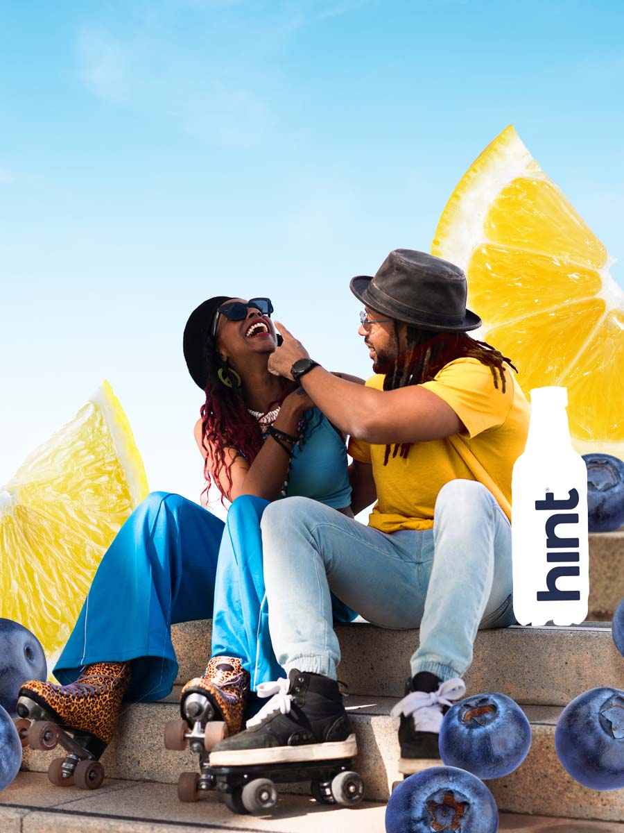 A collage of two people sitting down and laughing next to a bottle of hint water.