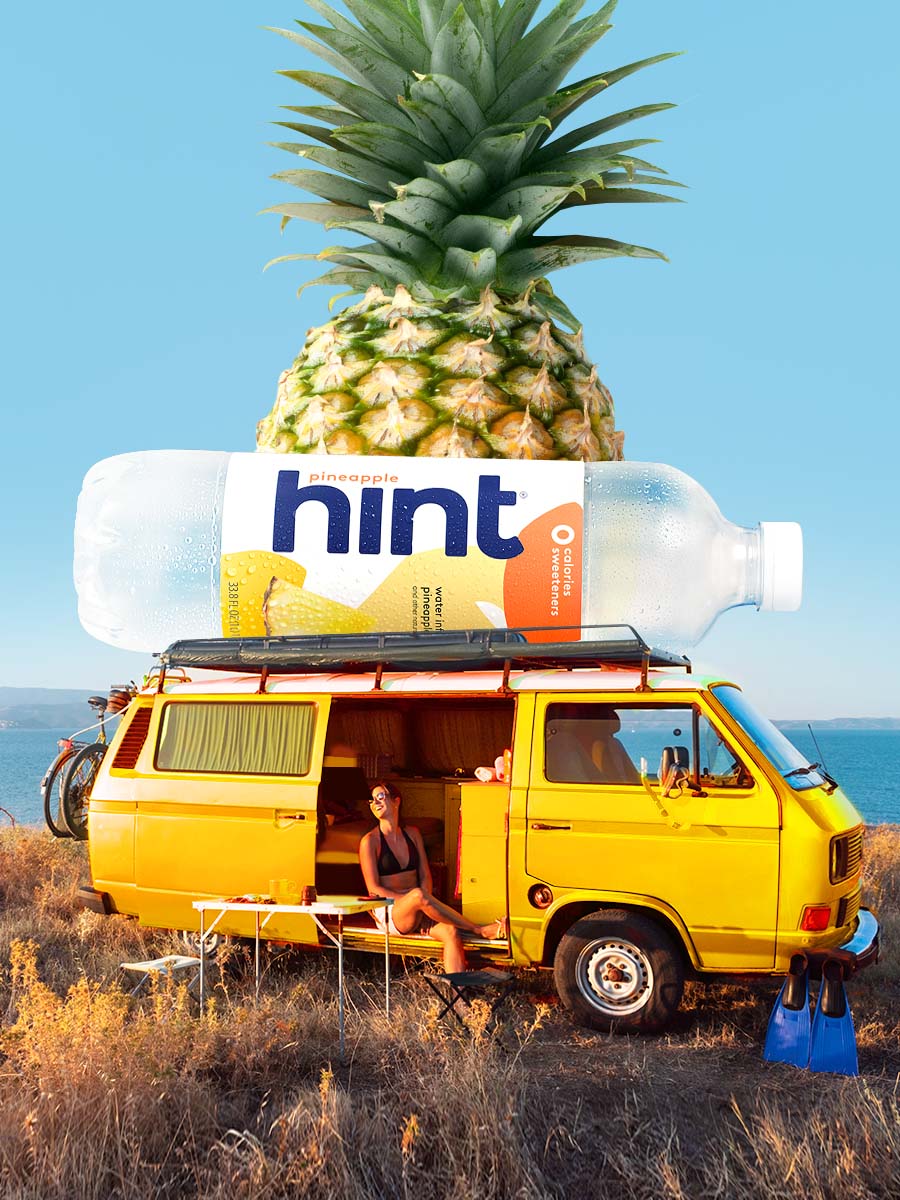 A collage of a woman sitting in an older model of a yellow Volkswagen on the coast watching a sunset. On top of the Volkswagen is a 1L bottle of pineapple hint water with an oversized whole pineapple behind these two items.