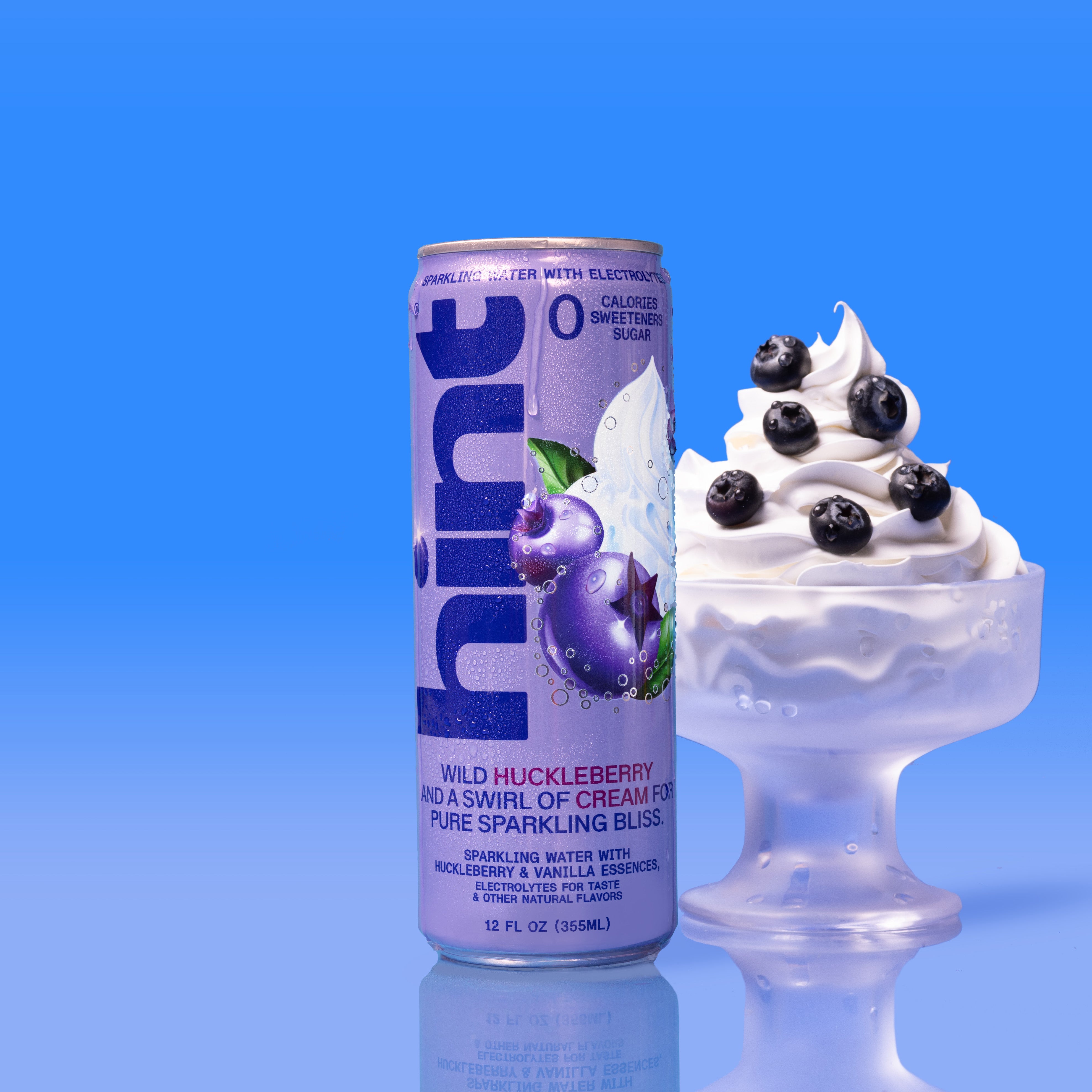 Can of Hint wild huckleberry and cream flavored sparkling water, zero calories, sweeteners, and sugar, 12 fl oz